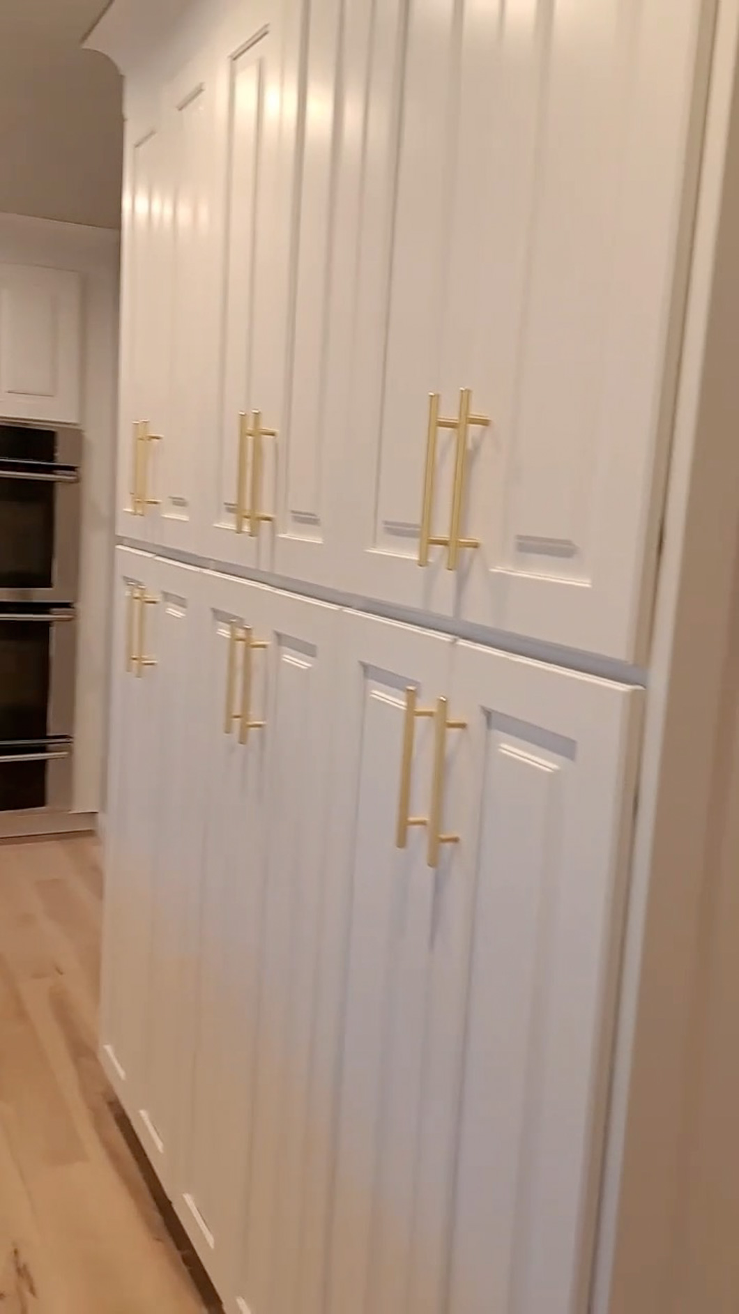 Painted pantry cabinets and built-in storage